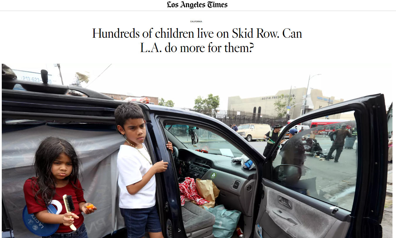 Children in a van on skid row