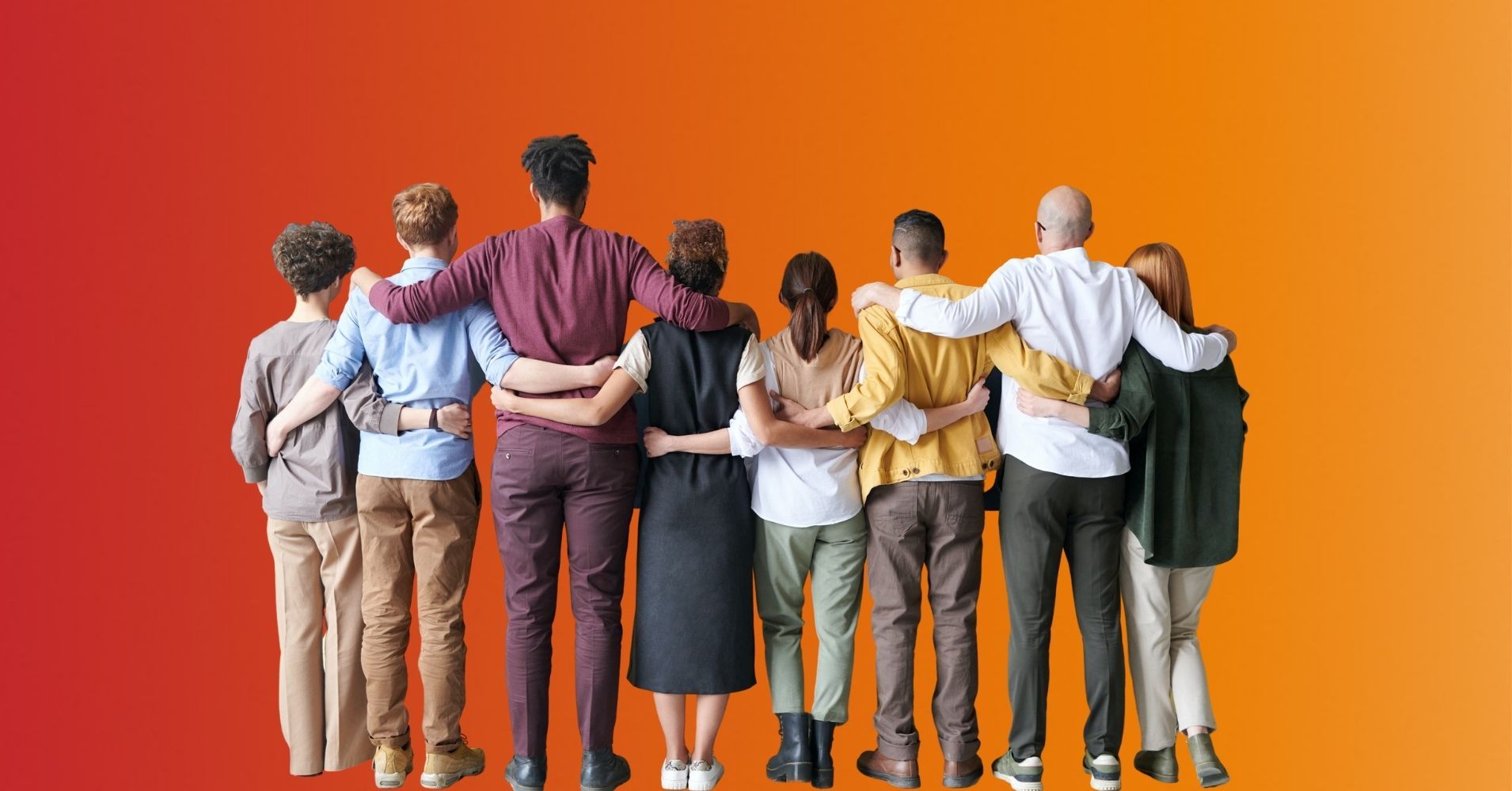 View from behind of a group of people who have their arms around each other.